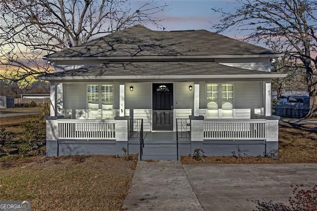 bungalow-style home with covered porch