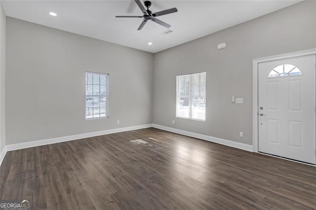 foyer entrance with dark hardwood / wood-style floors and ceiling fan