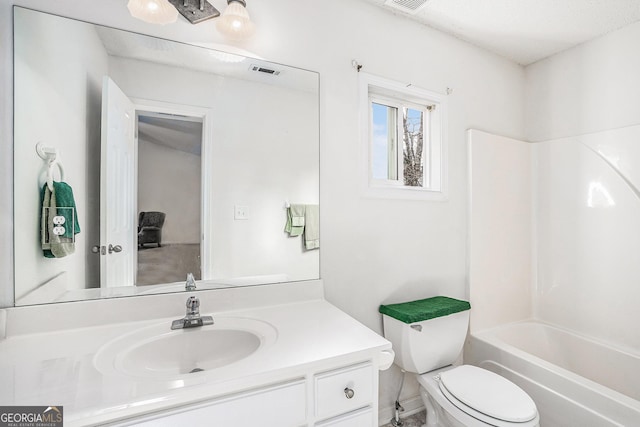 full bathroom with vanity,  shower combination, and toilet