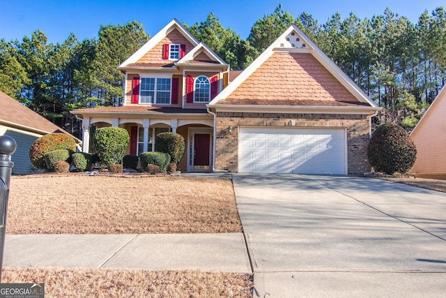 view of front of property with a garage