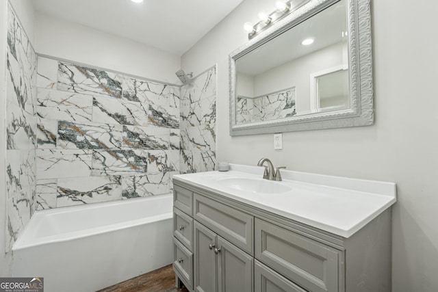 bathroom with shower / tub combination and vanity