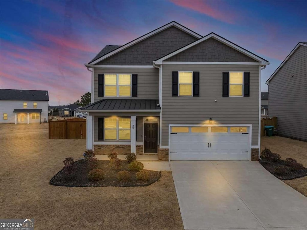 view of front of house with a garage