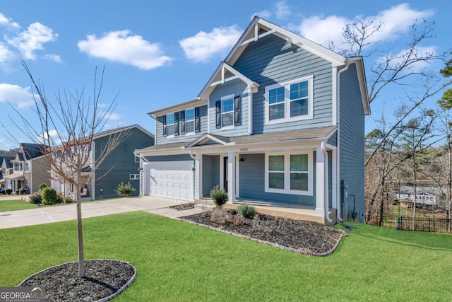 craftsman inspired home featuring a garage and a front lawn