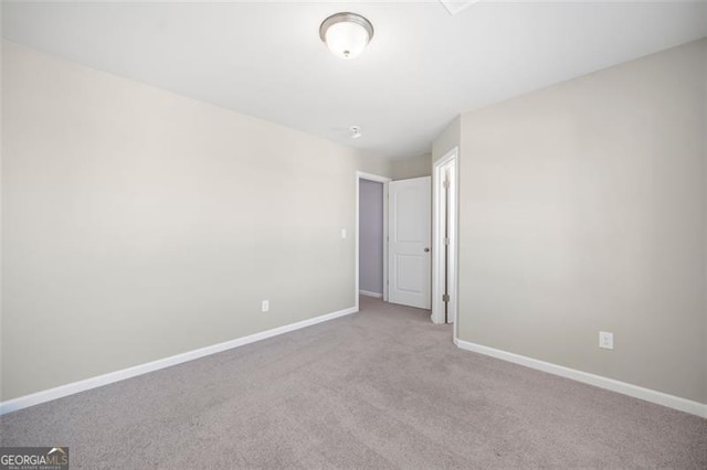 view of carpeted spare room