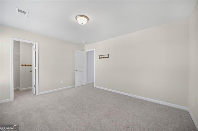 empty room with light carpet