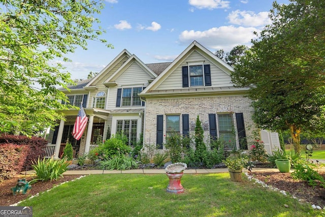 view of front of home with a front yard