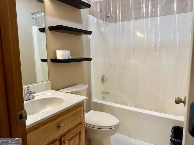 full bathroom with vanity, toilet, and shower / bath combo