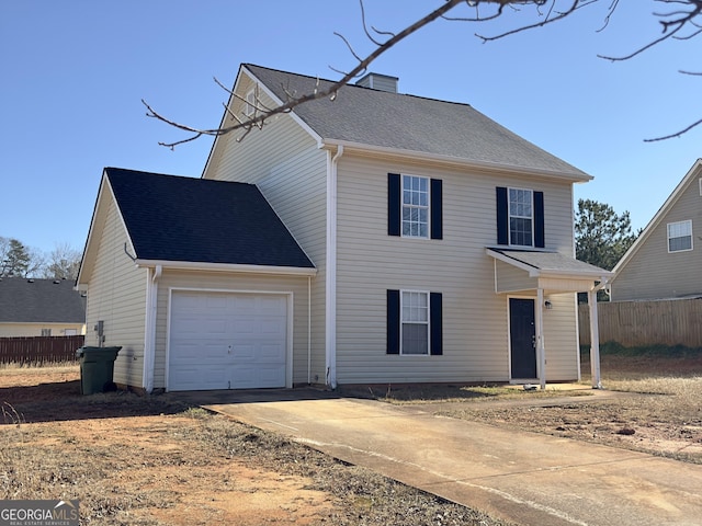 front of property featuring a garage