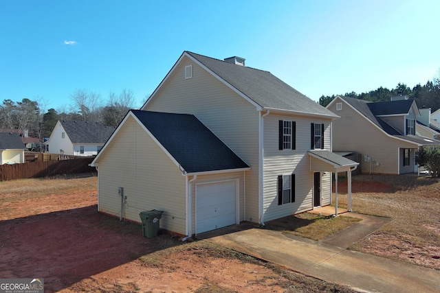 view of property exterior featuring a garage