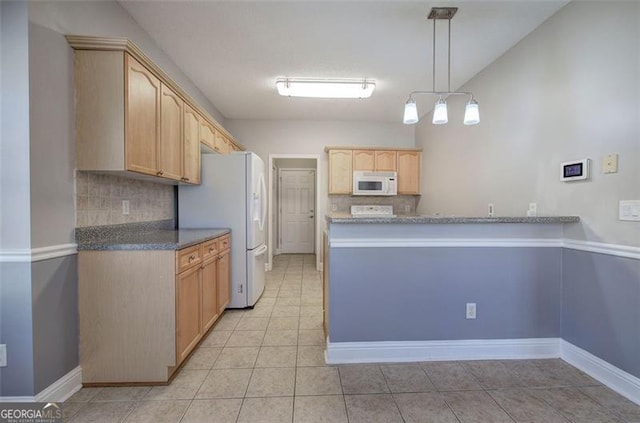 kitchen with light brown cabinets, white appliances, hanging light fixtures, and tasteful backsplash