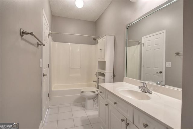 full bathroom with vanity, bathing tub / shower combination, tile patterned floors, toilet, and a textured ceiling