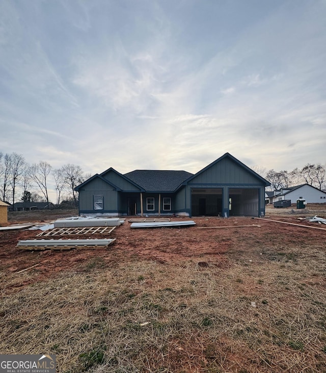 ranch-style home featuring a garage