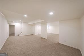 basement featuring carpet floors