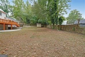 view of yard with a patio and a deck