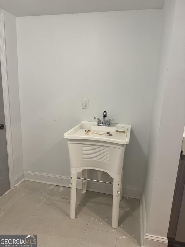 bathroom with tile patterned flooring