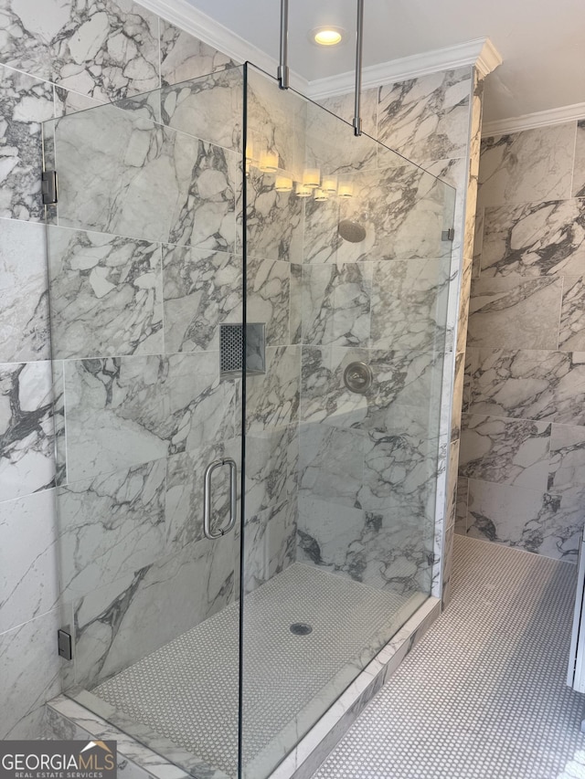 bathroom featuring walk in shower and ornamental molding