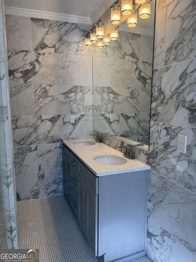 bathroom featuring crown molding and vanity