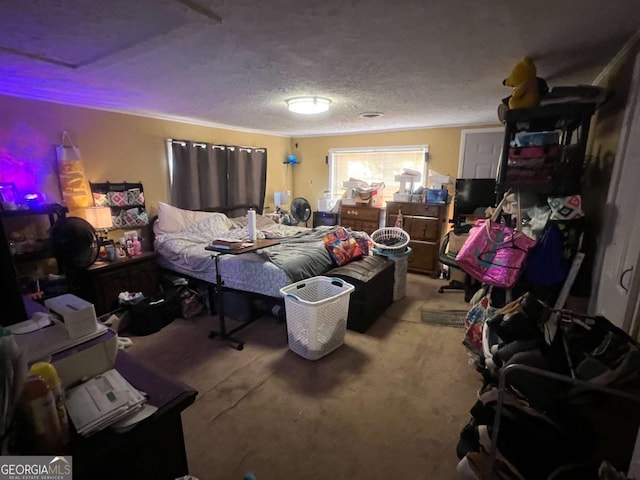 bedroom with carpet flooring and a textured ceiling