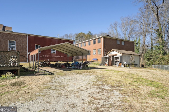 rear view of house with a carport