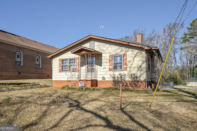 view of front facade with a front yard