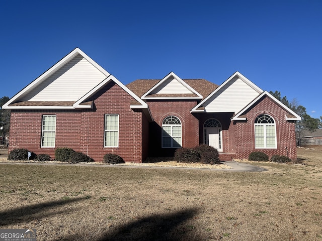 view of front property with a front lawn