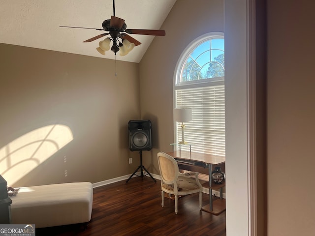 office area featuring ceiling fan, dark hardwood / wood-style flooring, and lofted ceiling