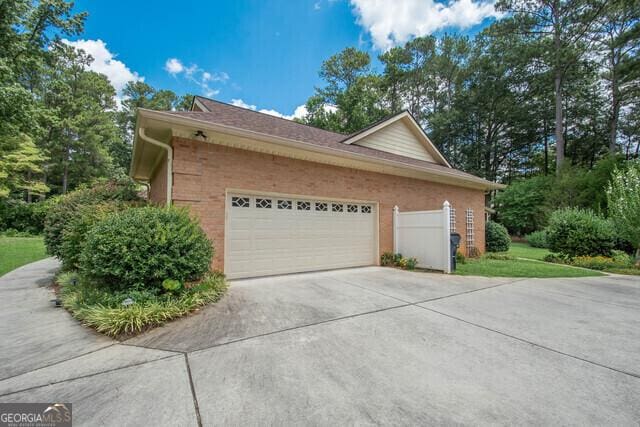 view of property exterior with a garage