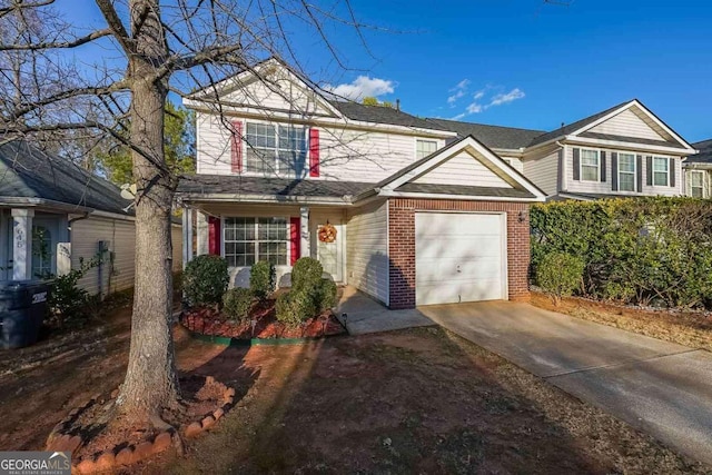 front of property featuring a garage and central AC