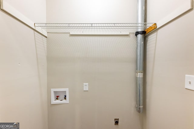 laundry room featuring hookup for a washing machine and electric dryer hookup