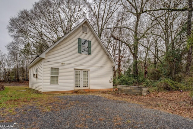 12178 Brown Bridge Rd, Covington, GA 30016 - view of property exterior featuring french doors