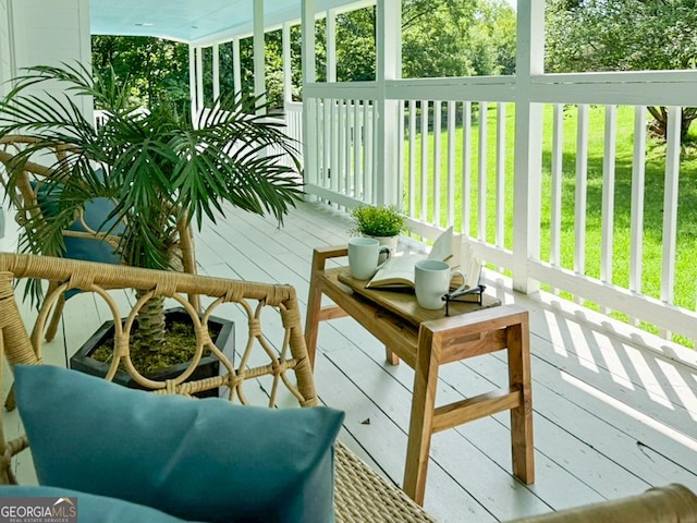 wooden balcony featuring a wooden deck