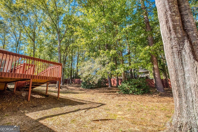 view of yard with a deck