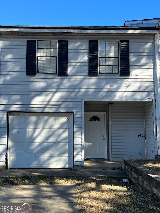 view of front of property featuring a garage