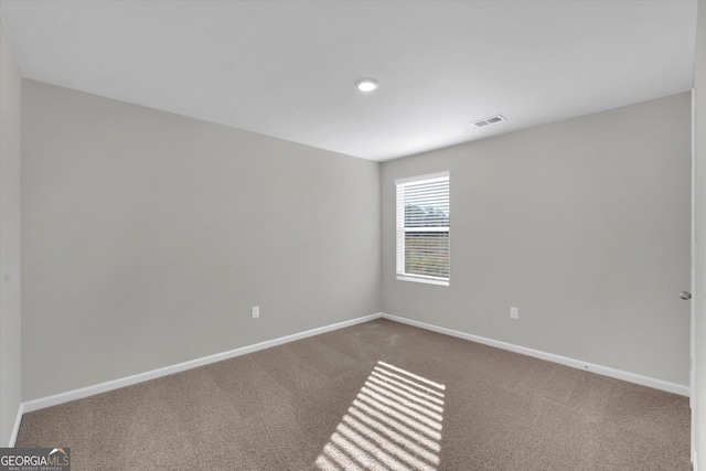 spare room with carpet flooring