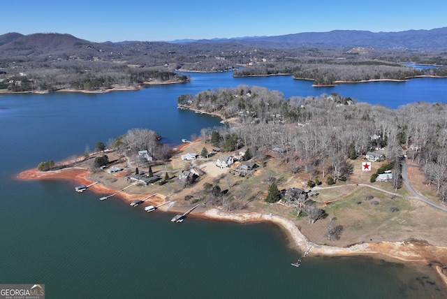 bird's eye view with a water and mountain view