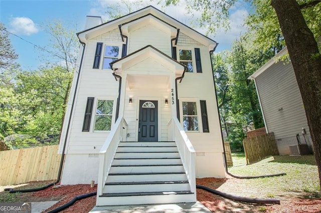 view of front of home with cooling unit