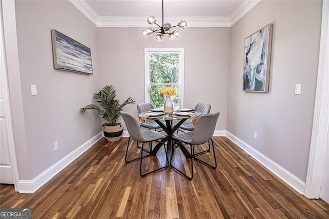 dining area featuring a chandelier, dark hardwood / wood-style flooring, and crown molding