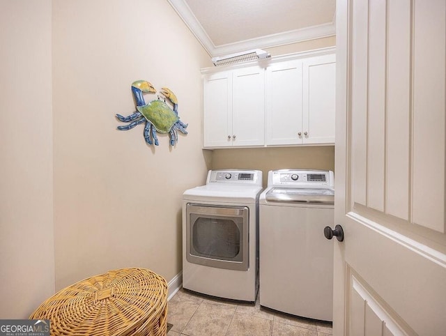 clothes washing area with separate washer and dryer, light tile patterned floors, cabinets, and ornamental molding