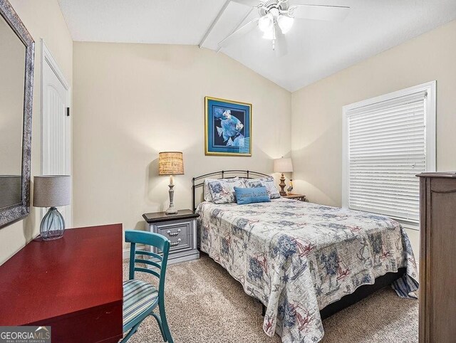 carpeted bedroom featuring ceiling fan, a textured ceiling, and ornamental molding