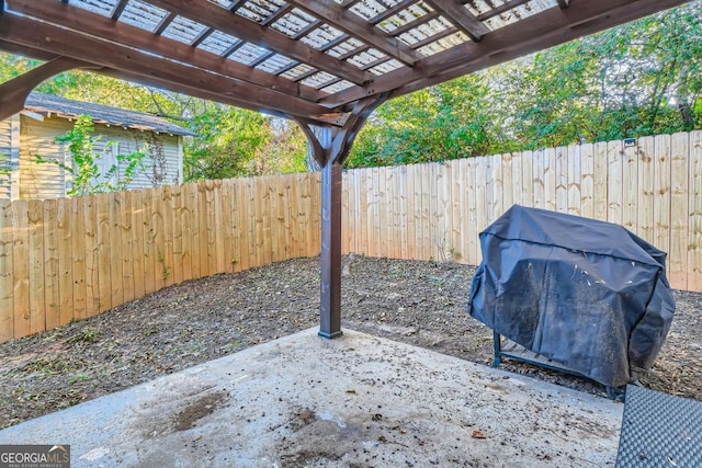 view of patio with a grill