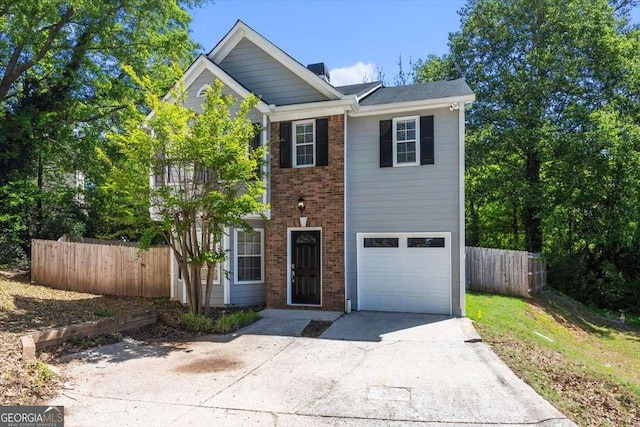 view of front of property featuring a garage