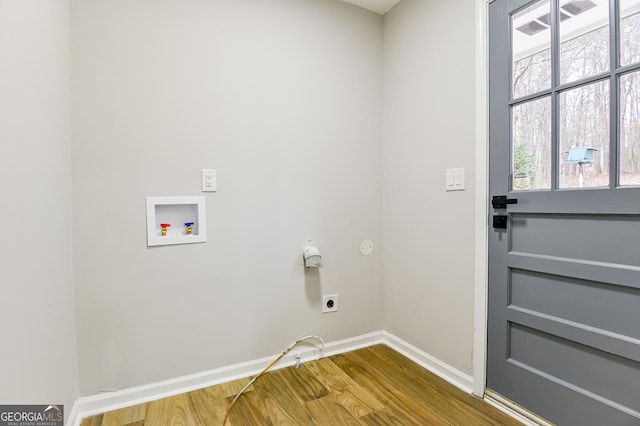 laundry area with hardwood / wood-style flooring, washer hookup, and hookup for an electric dryer