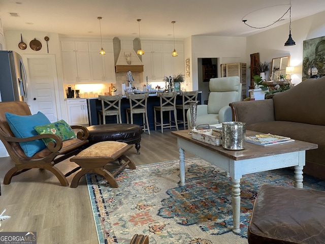 living room featuring light hardwood / wood-style floors