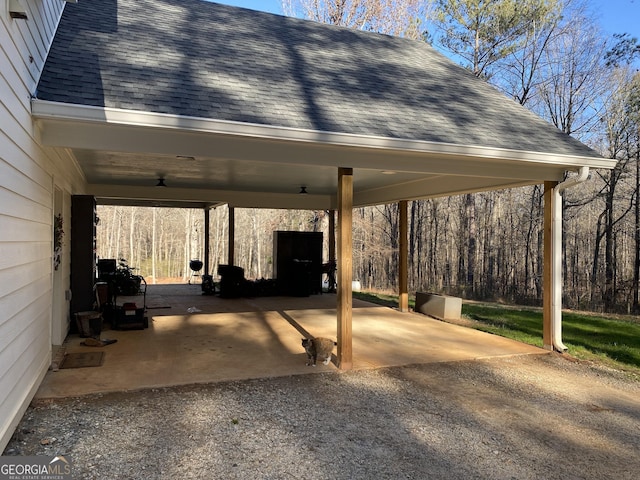 view of parking with a carport