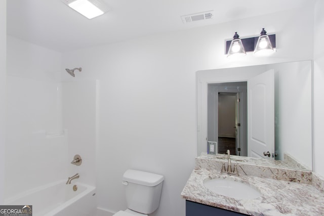 full bathroom with vanity,  shower combination, and toilet