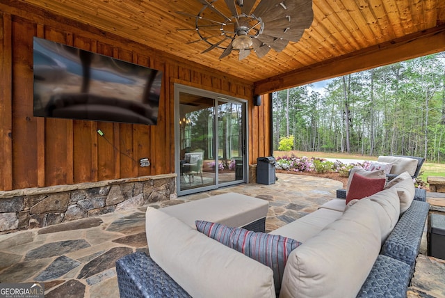 view of patio featuring ceiling fan and an outdoor hangout area