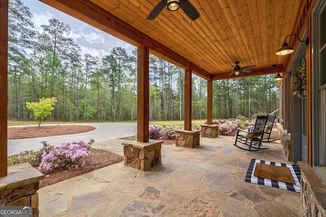 view of patio / terrace featuring ceiling fan