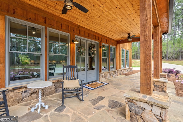 view of patio featuring french doors and ceiling fan