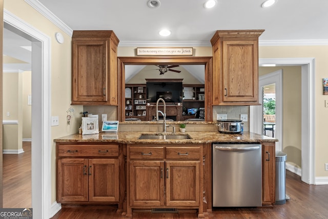 kitchen featuring dishwasher, dark hardwood / wood-style flooring, sink, backsplash, and ceiling fan