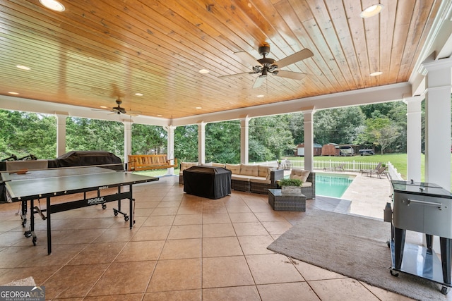 view of patio / terrace featuring an outdoor living space and ceiling fan